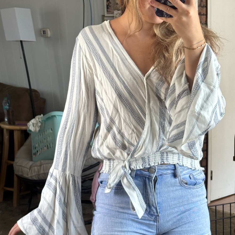 Elegant White and Gray Striped Blouse with Bell Sleeves